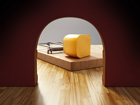 Mouse trap with a piece of cheese in front of hole. 3D illustration.